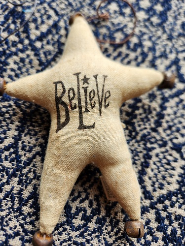 Believe star ornament